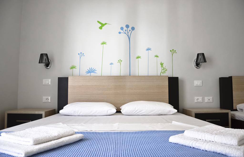 Dreibettzimmer mit Balkon
