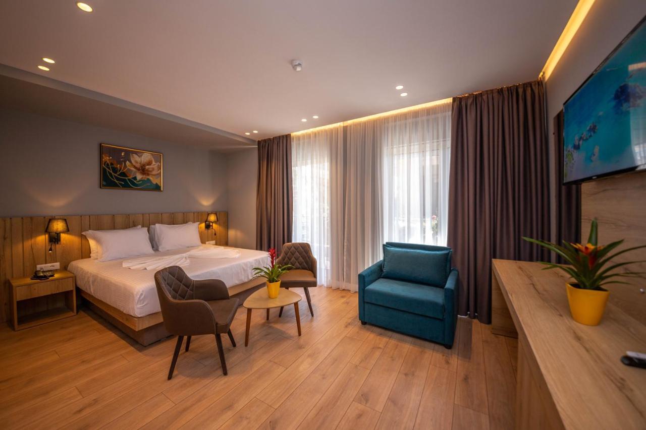 Double Room with Balcony + Sofa Bed and Side Sea View