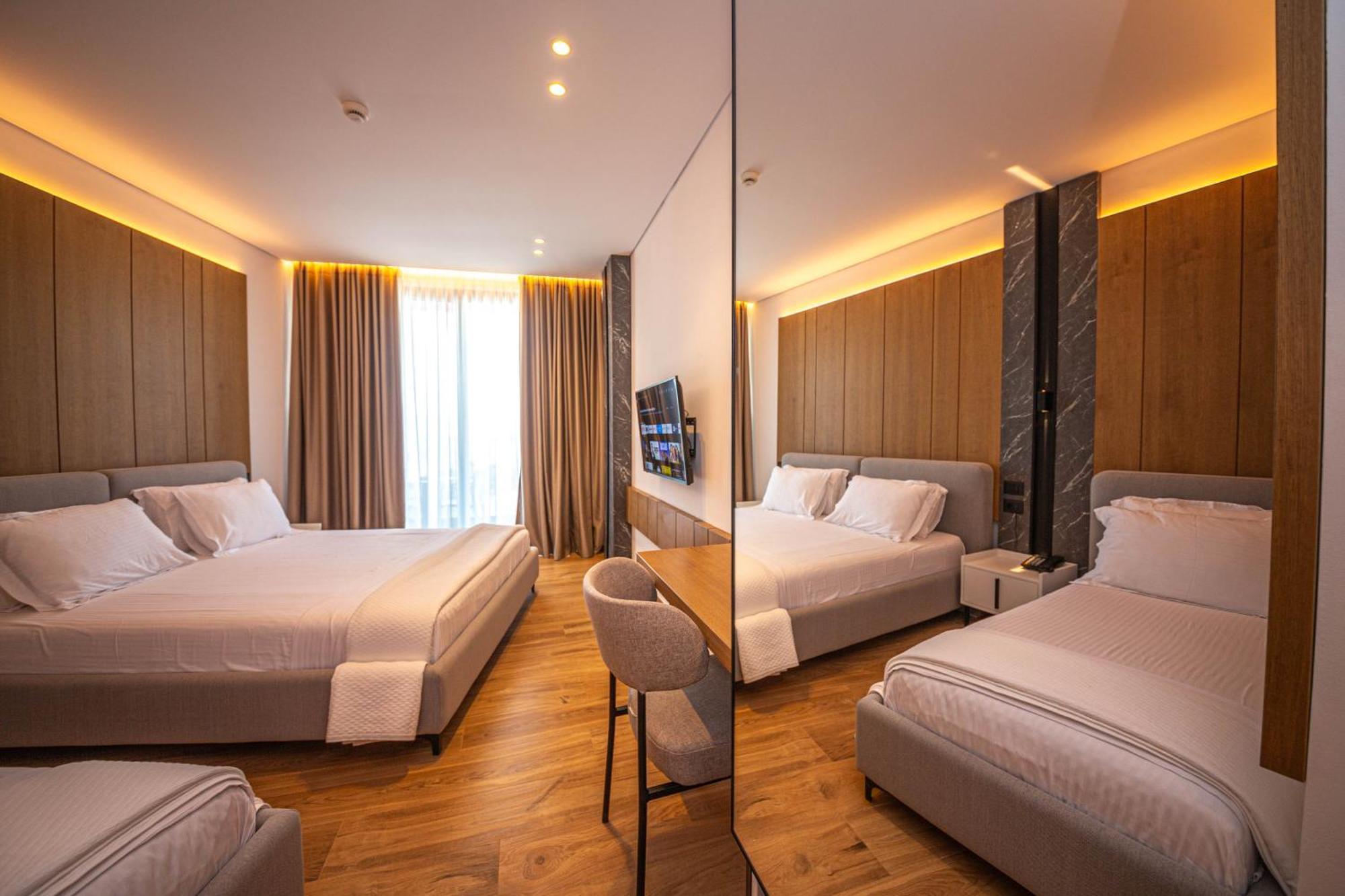 Chambre Triple de Luxe avec Balcon et Vue sur la Mer