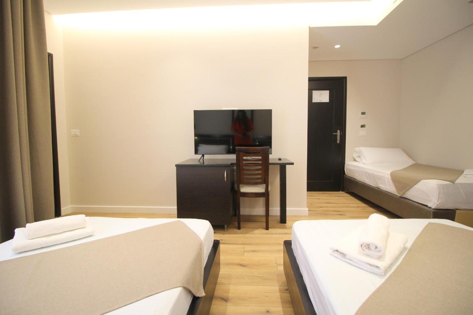 Dreibettzimmer mit Balkon