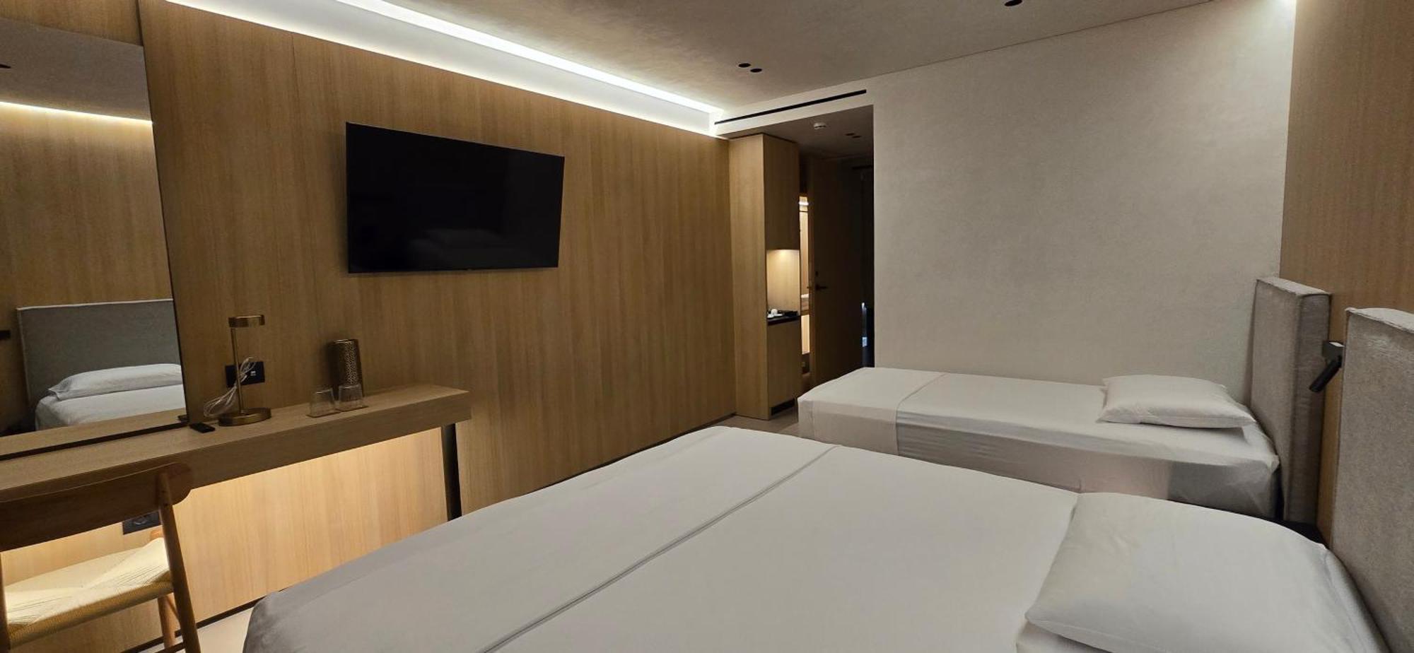 Superior Triple Room with Side Sea View