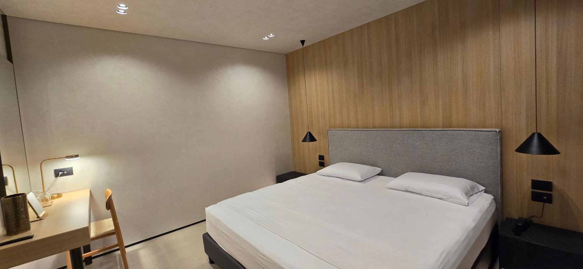 Junior Suite with Balcony with Side Sea View