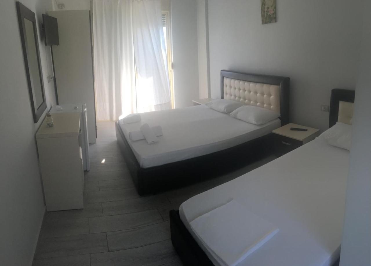 Dreibettzimmer mit Meerblick